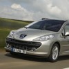 Photo 3/4 avant dynamique Peugeot 207 SW Gris Cendré phase 1 (2007) - 1-011