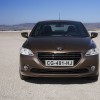 Photo face avant Peugeot 301 I Brun Rich Oak (2012)