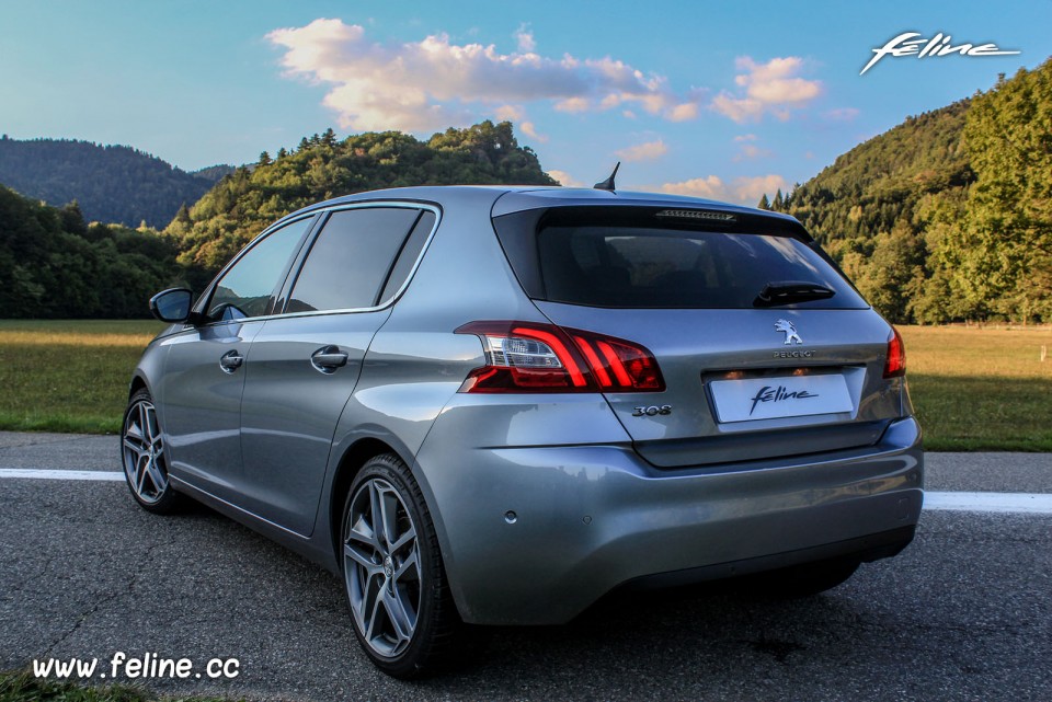 Photo 3/4 arrière Peugeot 308 II Féline Gris Artense 1.6 e-HDi 115 -1-016