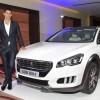 Photo Novak Djokovic et la Peugeot 508 RXH restylée 2014